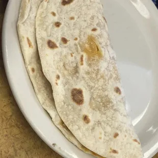 Hidden in this overfilled Taco is very tasty Chorizo con huevo. Great flavor. It was not greasy.