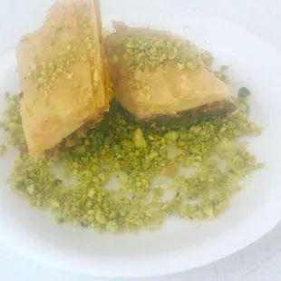 Baklava- Filled with walnuts and topped with pistachios.