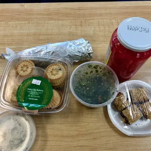 My check-out selection (clockwise): falafel sandwich, pickled turnips, poppyseed date pastry, tabbouleh, maamoul, baba ghanosh.