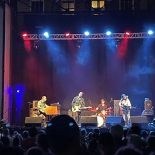 a band performing on stage