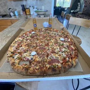 28&quot; works, extra cheese, salami &amp; jalapeños.