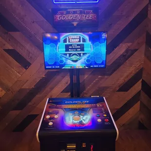 a neon sign and a video game