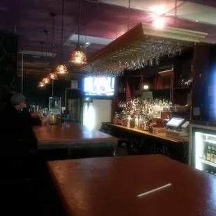 Liquor store / bar combo.  Not bad.  I like sitting at the bar and ordering food from Rice and Roll ( they bring it here)