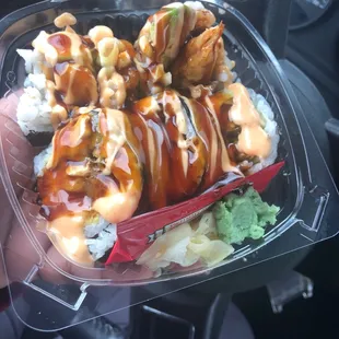 I guess to save money, pack all the sushi in the small container shrimp tempura