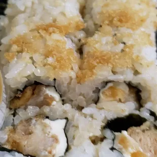 a plate of sushi rolls