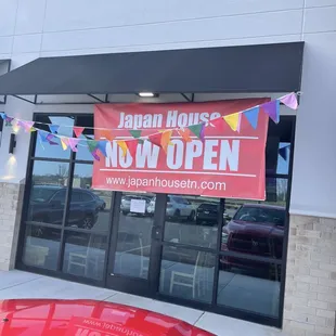 The Open Now Sign outside The Restaurant.