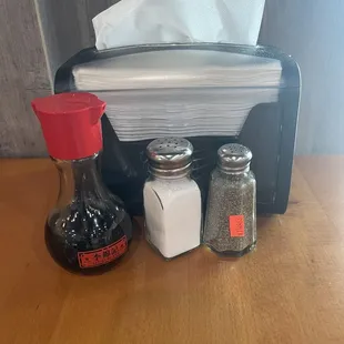 A pic of what is seating on the tables inside the restaurant.