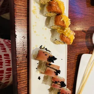 The one with the black fish eggs is a smoked salmon...DELICIOUS