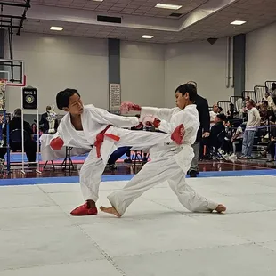 We compete in both open and traditional tournaments.