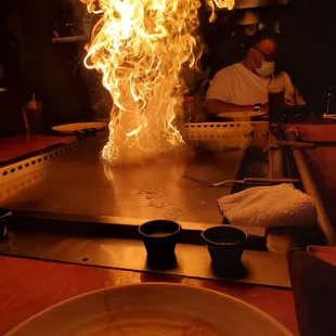  large fire coming out of a grill