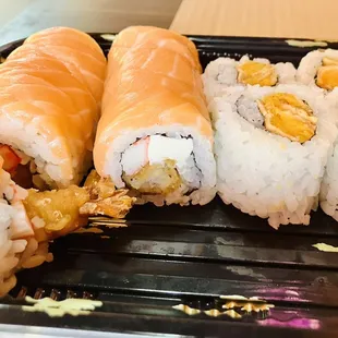 a tray of sushi rolls