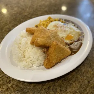Curry with corn and tofu and fried egg