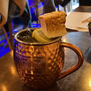 a moscow mule with a slice of lime in it