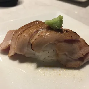 Seared O-toro (fatty tuna) w/a touch of wasabi. Such oily melt in your mouth goodness!