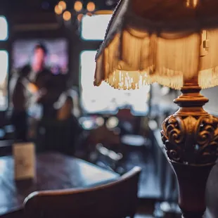 Cozy, quirky decor makes the space feel like Grandma's attic was raided by an art student.