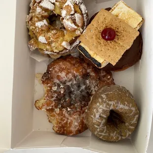 Funnel cake donut, s&apos;mores, fritter, blueberry cake