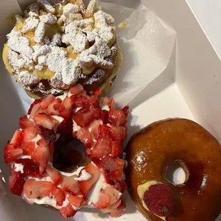 Banana pudding donut, strawberry donut, and Creme Brulee Donut