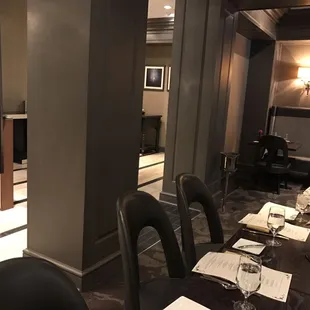 a man sitting at a table in a restaurant