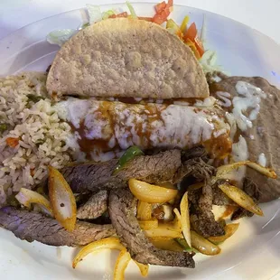 Fajita Mix $15.99 and comes with a tostada con queso and guacamole salad as well as what is seen here.