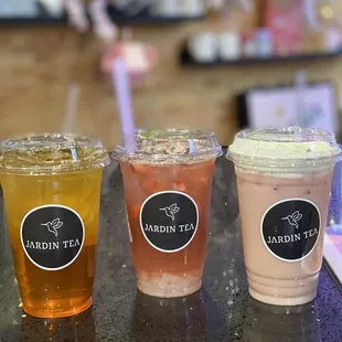 lychee jasmine green tea, strawberry hibiscus tea w/ lychee jelly, jardin pink milk tea (left to right)