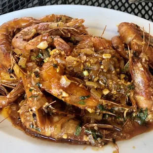 Shrimp with head on. Must order. Delicious garlicky sauce