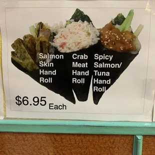 a sushi menu displayed on a wall