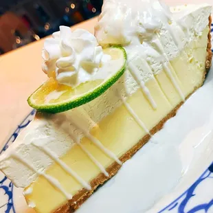 July Dessert Special: Slice of key lime pie!Drizzled with sweet coconut milk and topped with whipped cream.