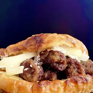a sausage and cheese sandwich