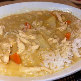 Yellow curry with white steamed Sticky Rice