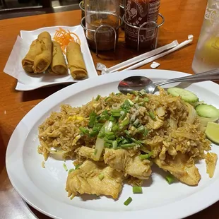 Fried rice w/chicken and a side of veggie egg rolls 10/10 Plate should of been fuller but was still good.