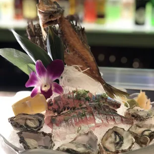 Leo prepared special Aji Mackerel and Kumamoto Oysters.  Excellent all around!