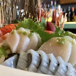 Just another Saturday night at Jasmine.  Salmon, Ama Ebi, scallops with fresh wasabi and excellently presented squid.