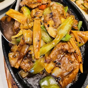 a plate of stir fried vegetables