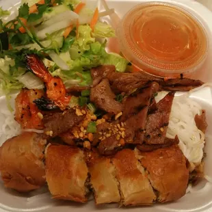 Combination vermicelli salad with egg roll, pork and shrimp..all for under $9. Can&apos;t beat that!
