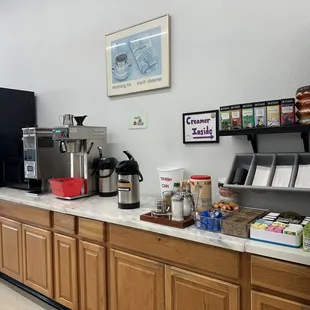 a coffee bar with coffee machines