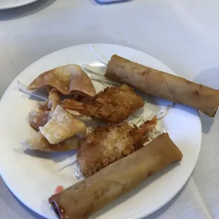 Appetizers from dinner add-on - egg roll, cheese wonton, shrimp.