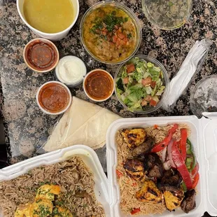 Lentil soup, Chicken Beef and Lamb Shawarma Plate, Shrimp in Garlic Sauce, Fava Bean Appetizer and Pita Bread.