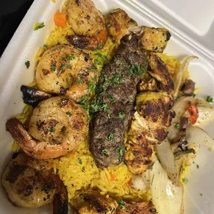 Shrimp kabob, kofta kabob, chicken kabob, mixed grilled veggies, yellow rice.