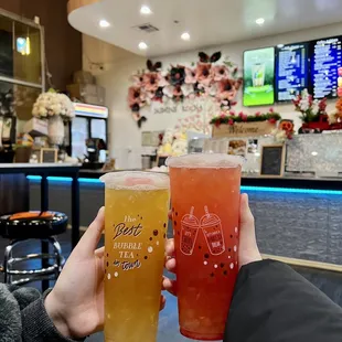 Left: passion fruit tea with aloe jelly     Right: red moonshine with peach popping boba