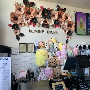 a wall of stuffed animals