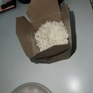 White Rice Dry and not very warm. Warm delicious rice has more condensation because it is properly cooked.