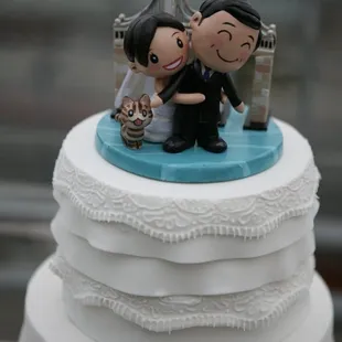 Close up of cake (custom cake topper from Etsy)