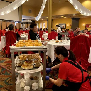 customers serving food to customers