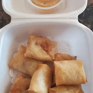 Fried banana coins with a honey sesame dipping sauce