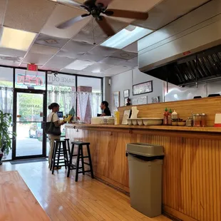 a woman sitting at the counter