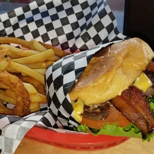 Cheezburger with Bacon and a side of half fries and half onion rings. So yummy !