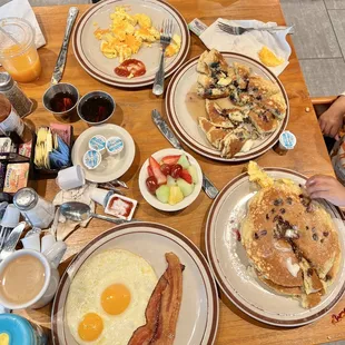 a table full of breakfast foods