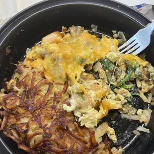 Prawn scramble with hash browns.