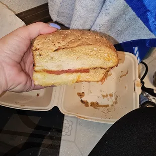 The sandwich with only two dry pieces of bread two pieces of salami and four pieces of pepperoni completely dry. So disgusting