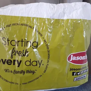 a plastic bag with the words starting fresh every day